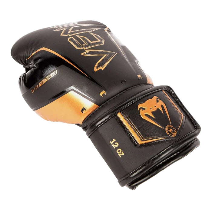 Black and gold boxing glove with brand logo on a white background